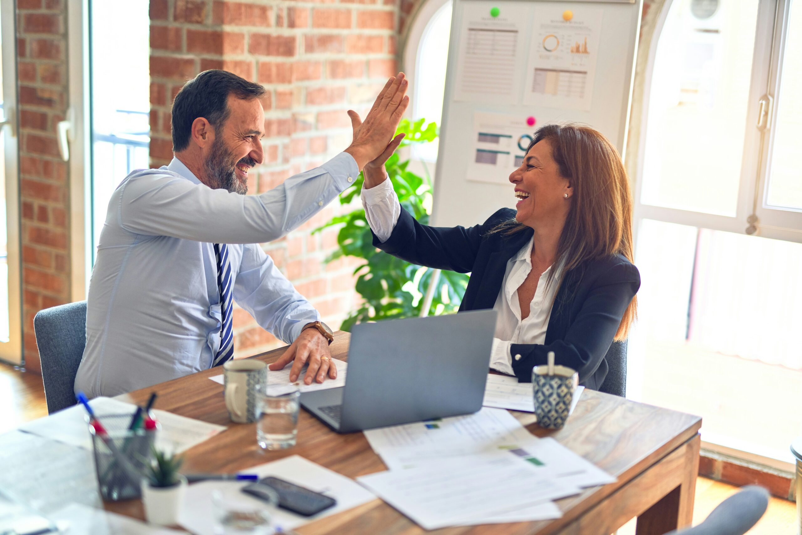 image of a man and a woman making a deal
